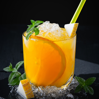 Melon cocktail with rum and orange