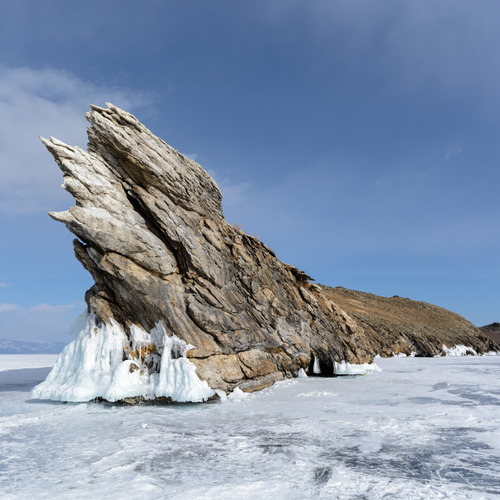 Landscape of winter lake Baikal. Island Ogoy. / Кристальный лед Байкала