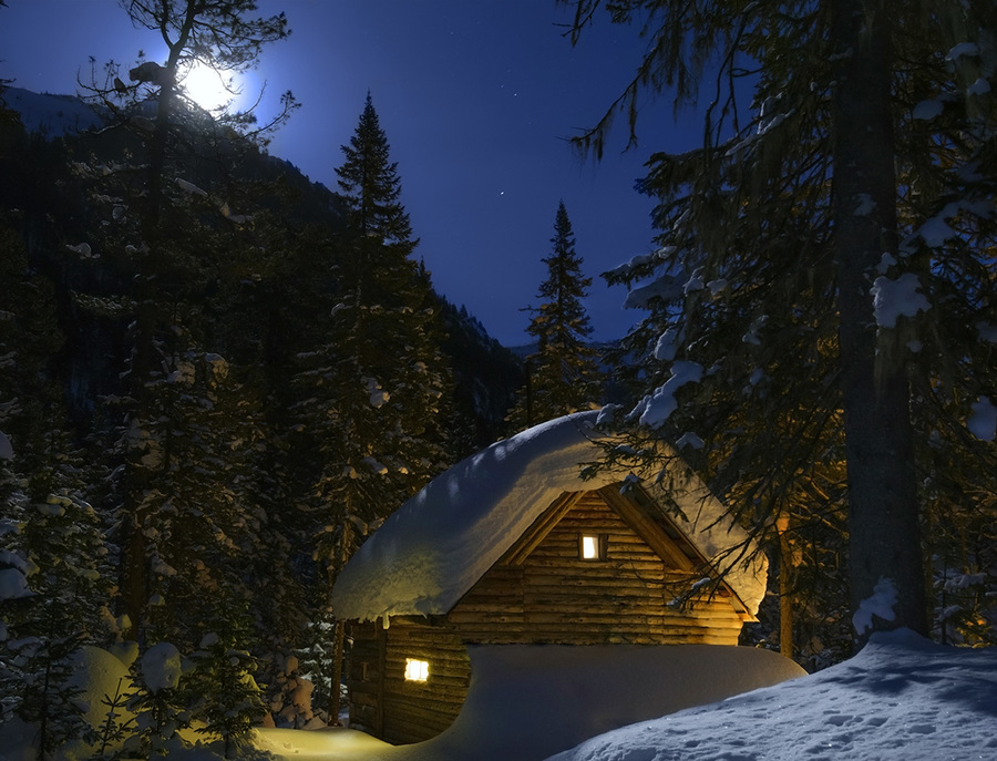 Fairy house in the forest moonlit winter night
