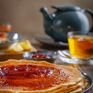 Pancakes with strawberry jam.