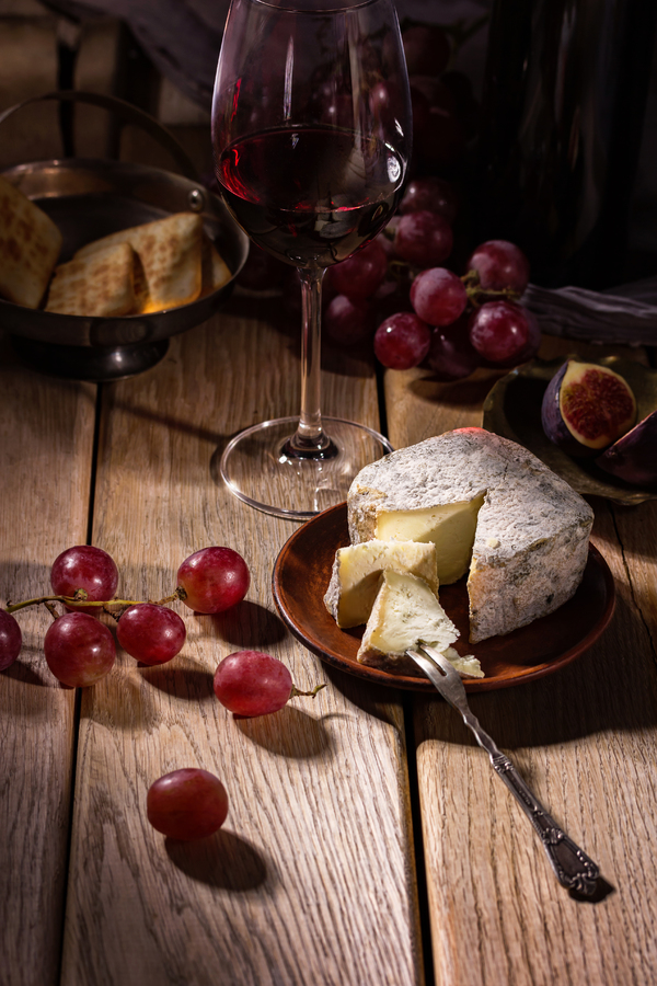 Glass, wine and fruit on the table