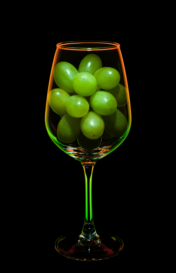 Glass with grapes