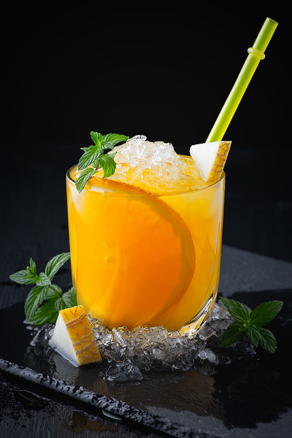 Melon cocktail with rum and orange